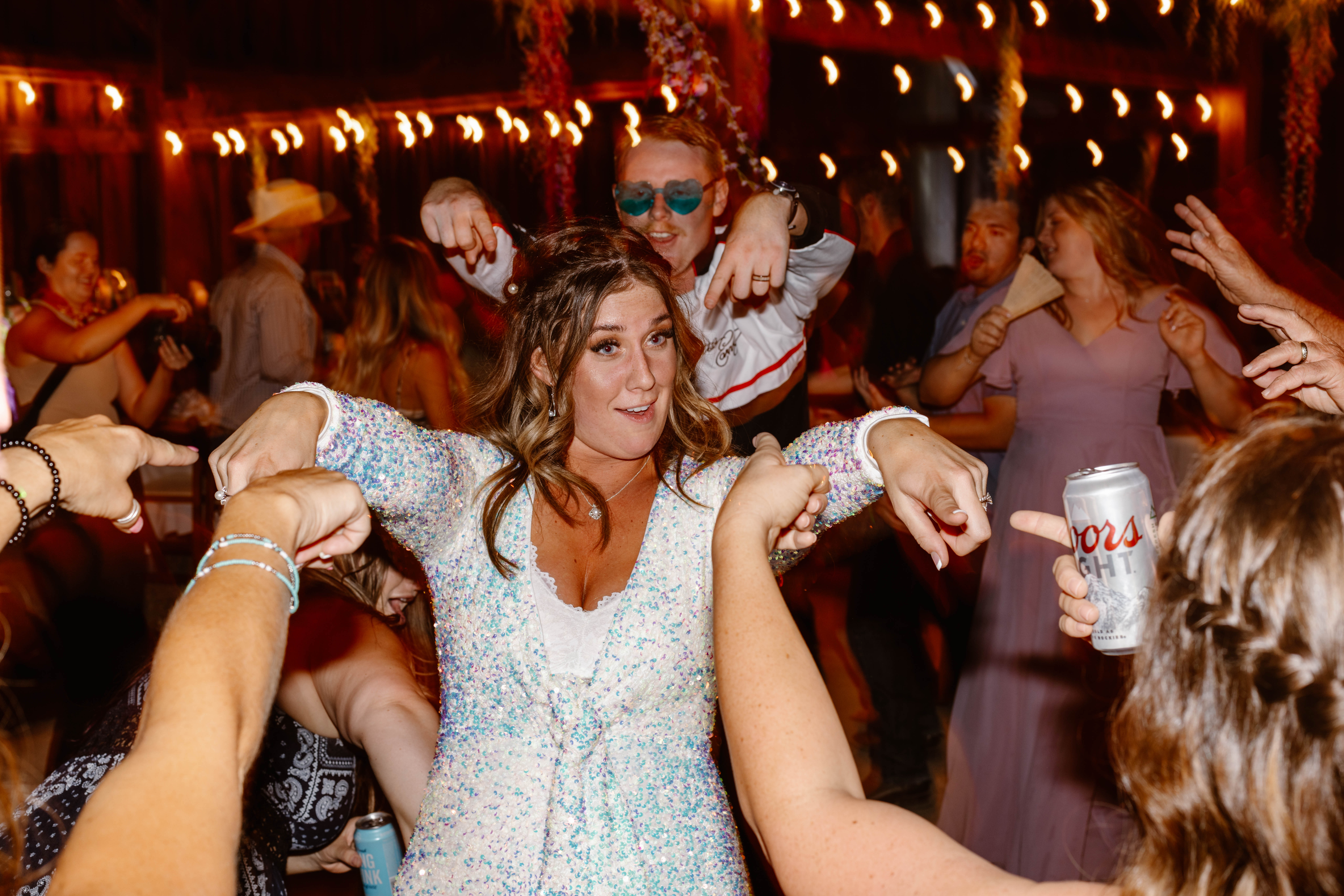 Bride dancing on the dance floor at her Lake Tahoe wedding, enjoying a joyful and intimate moment surrounded by love and celebration.