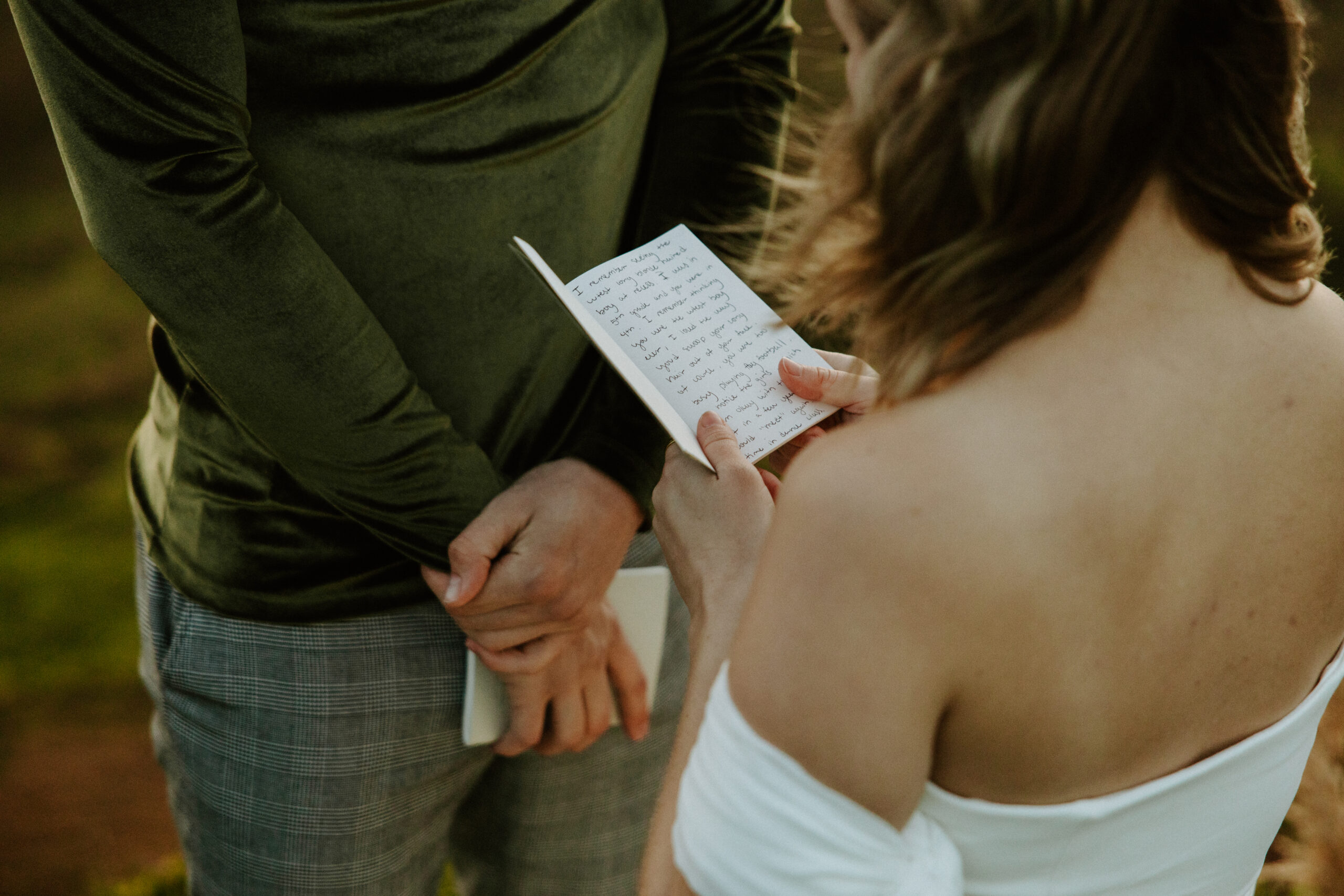 bride reading vows in the highlands