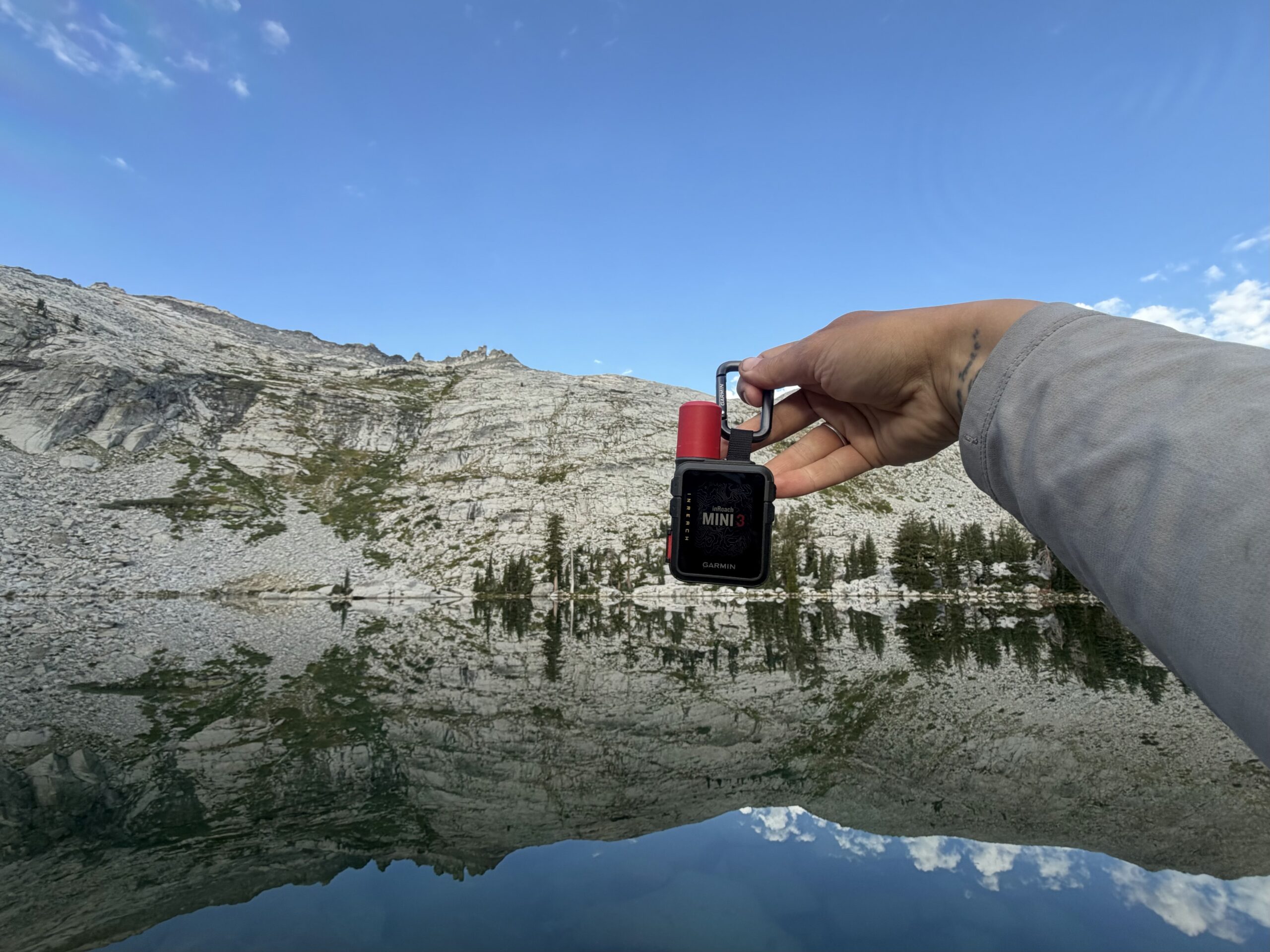 backpacker using garmin inreach mini 3
